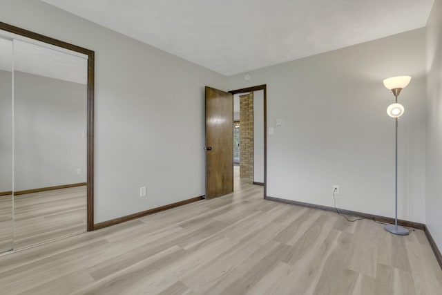 8015 Alspach Rd NW, Lancaster, OH 43130 - unfurnished bedroom with wood finished floors and baseboards