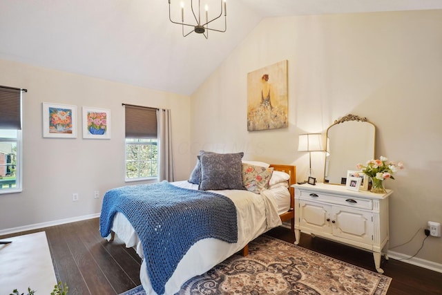 bedroom featuring a chandelier, dark wood-type flooring, baseboards, and vaulted ceiling