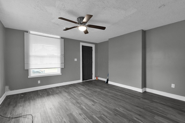 820 Poplar St Unit 820/822, Nelsonville, OH 45764 - unfurnished room with a ceiling fan, dark wood-style floors, and baseboards
