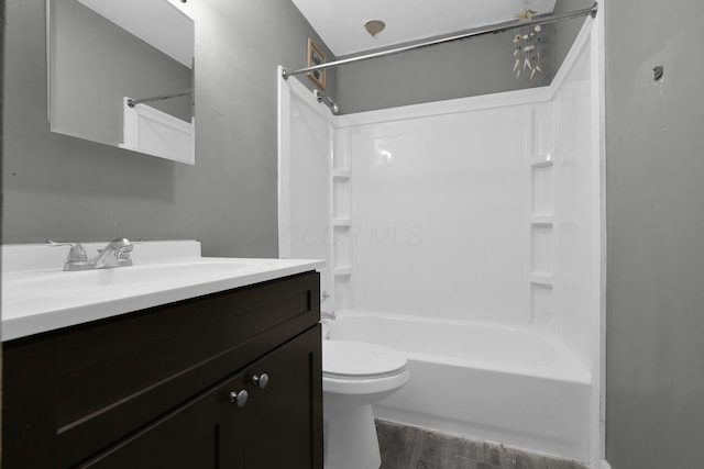 820 Poplar St Unit 820/822, Nelsonville, OH 45764 - full bathroom with toilet, vanity, washtub / shower combination, and wood finished floors