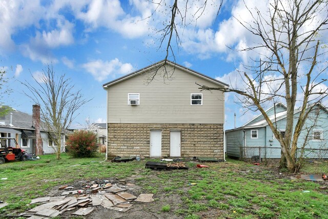 820 Poplar St Unit 820/822, Nelsonville, OH 45764 - back of property with a lawn and fence