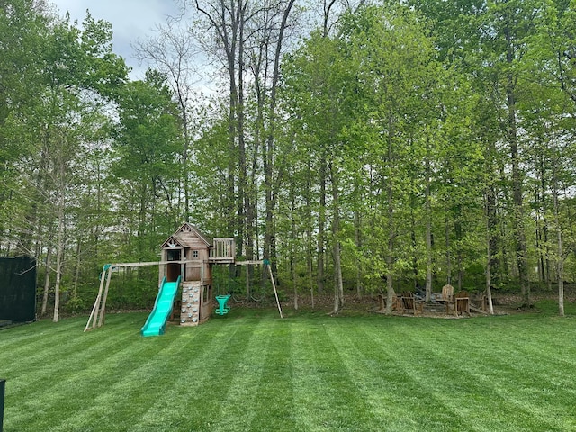 view of play area with a yard