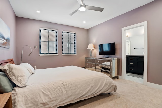 bedroom featuring light carpet, a ceiling fan, connected bathroom, and recessed lighting