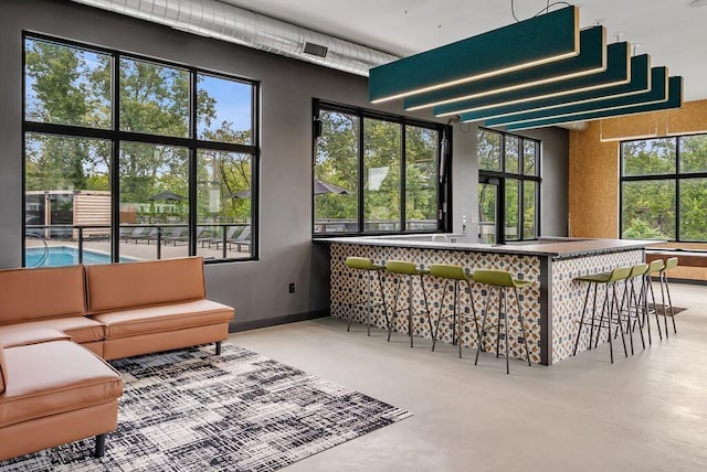 bar with concrete flooring