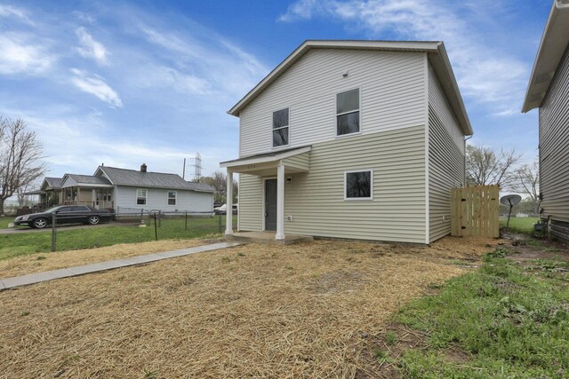 574 Koebel Ave, Columbus, OH 43207 - back of house with fence and a lawn