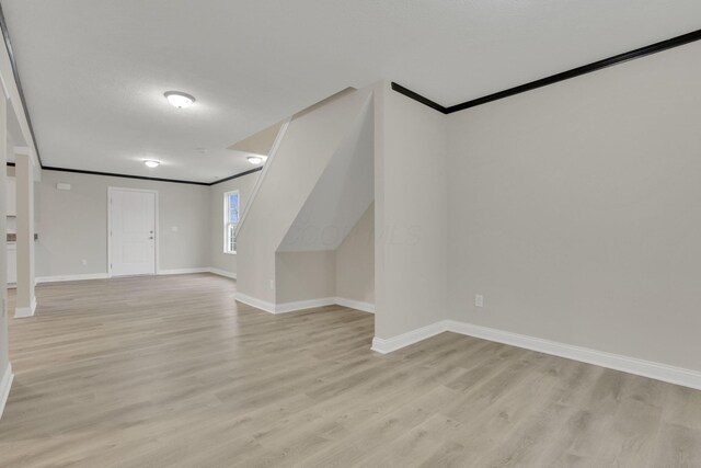 574 Koebel Ave, Columbus, OH 43207 - interior space featuring baseboards, crown molding, and light wood finished floors