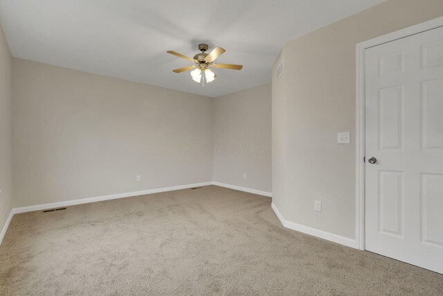 574 Koebel Ave, Columbus, OH 43207 - empty room featuring baseboards, visible vents, carpet, and a ceiling fan
