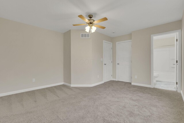574 Koebel Ave, Columbus, OH 43207 - unfurnished room featuring baseboards, visible vents, ceiling fan, and carpet