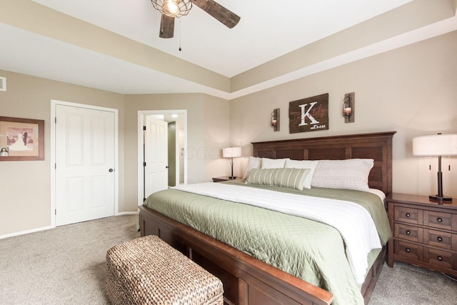 bedroom featuring visible vents, carpet flooring, baseboards, and ceiling fan