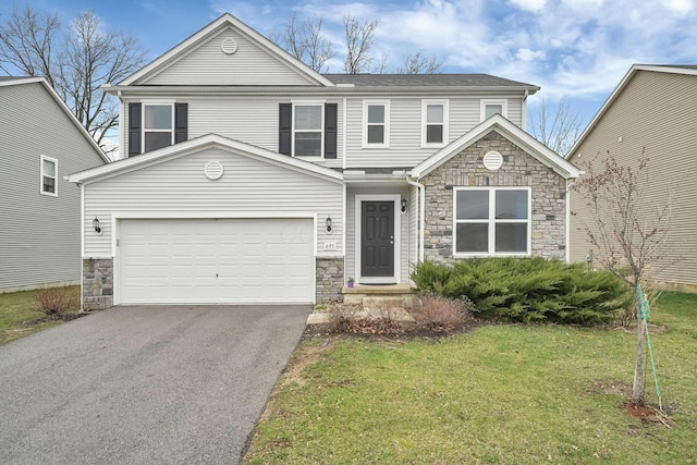 traditional-style home featuring a front lawn, stone siding, and driveway