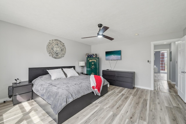 21100 Fleckinger Rd, West Mansfield, OH 43358 - bedroom with baseboards, ceiling fan, and wood finished floors