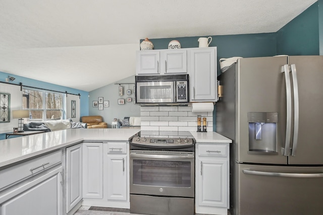 21100 Fleckinger Rd, West Mansfield, OH 43358 - kitchen with tasteful backsplash, light countertops, white cabinets, and stainless steel appliances