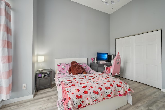 21100 Fleckinger Rd, West Mansfield, OH 43358 - bedroom featuring a closet, baseboards, and light wood finished floors