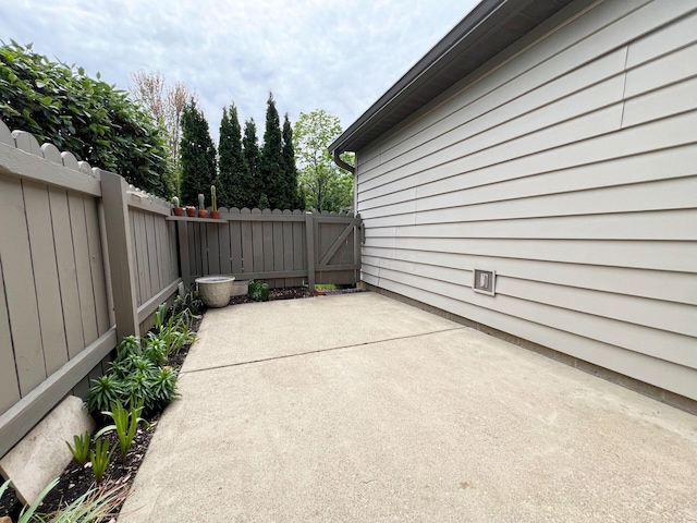 view of patio with fence