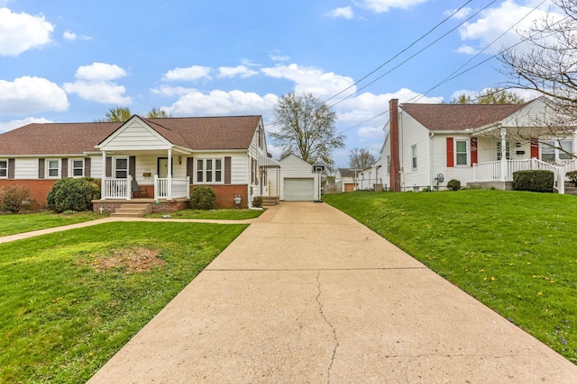 1738 W Chestnut St, Lancaster, OH 43130 - view of front facade featuring an outbuilding, a front lawn, covered porch, and a garage