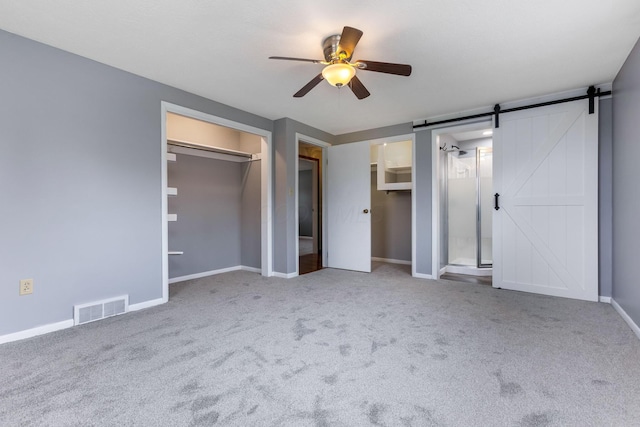 1738 W Chestnut St, Lancaster, OH 43130 - unfurnished bedroom with a barn door, visible vents, baseboards, and carpet floors