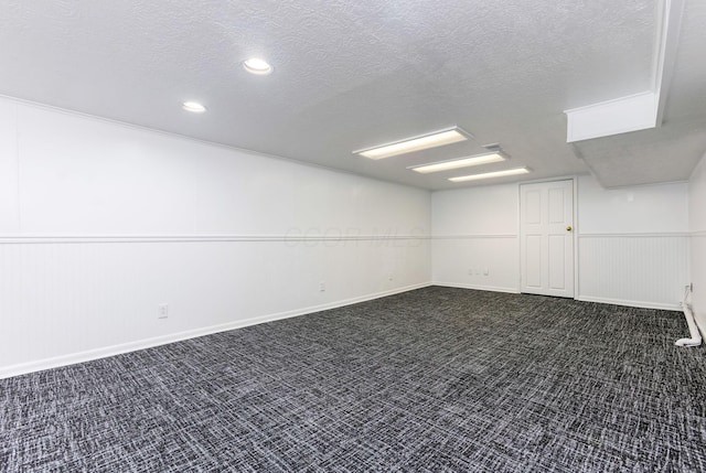 1738 W Chestnut St, Lancaster, OH 43130 - empty room featuring dark carpet, recessed lighting, wainscoting, and a textured ceiling