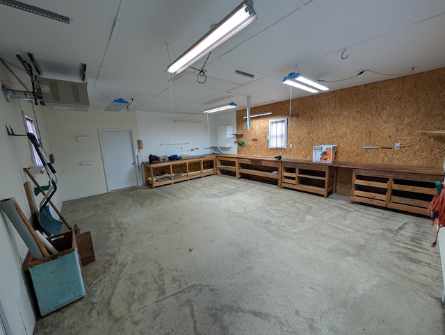 garage with a workshop area