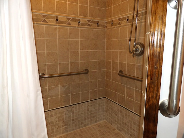 full bath with a shower stall