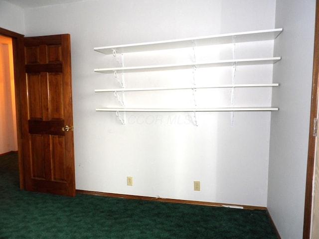 interior space featuring baseboards