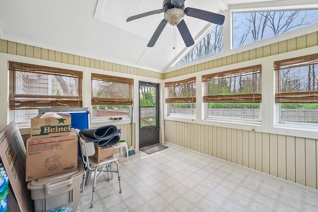 sunroom / solarium featuring ceiling fan