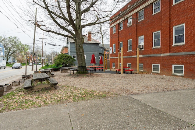 view of home's exterior featuring a residential view and brick siding