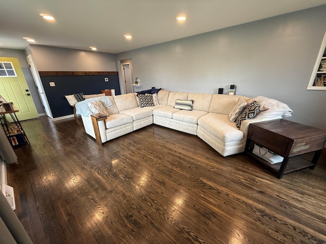 living room featuring wood finished floors and recessed lighting