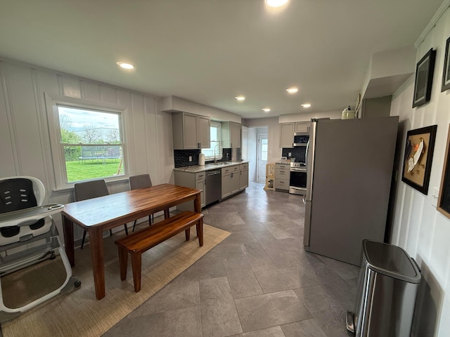dining room featuring recessed lighting