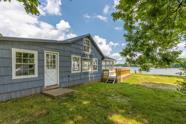 13384 Orchard Is NE, Millersport, OH 43046 - back of property featuring a deck with water view and a lawn