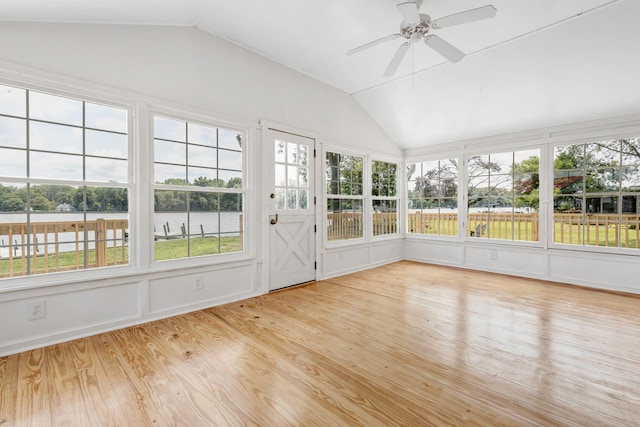 13384 Orchard Is NE, Millersport, OH 43046 - unfurnished sunroom featuring lofted ceiling, healthy amount of natural light, wood finished floors, and a deck with water view