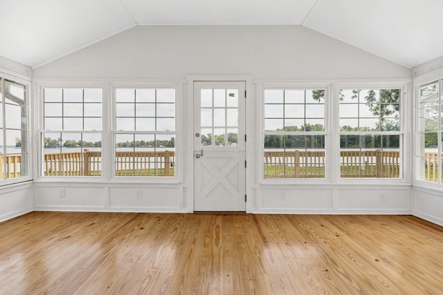 13384 Orchard Is NE, Millersport, OH 43046 - unfurnished sunroom featuring vaulted ceiling, wood finished floors, and a deck