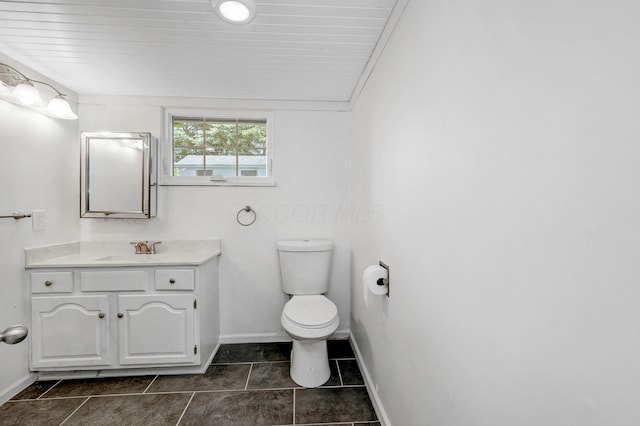 13384 Orchard Is NE, Millersport, OH 43046 - bathroom featuring toilet, baseboards, vanity, and tile patterned flooring