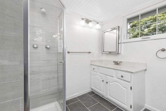13384 Orchard Is NE, Millersport, OH 43046 - full bathroom featuring a stall shower, tile patterned floors, vanity, and baseboards