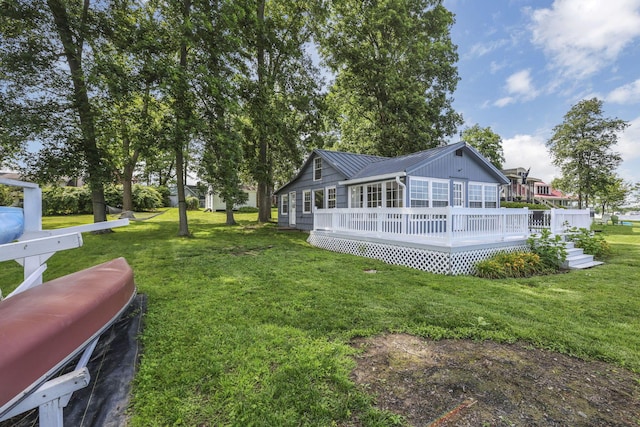 13384 Orchard Is NE, Millersport, OH 43046 - back of house featuring a lawn, a metal roof, and a deck