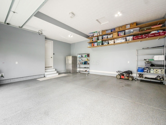 garage with baseboards