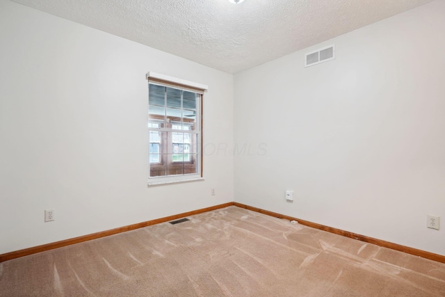 5955 Glen Village Dr, Dublin, OH 43016 - carpeted empty room featuring a textured ceiling, baseboards, and visible vents