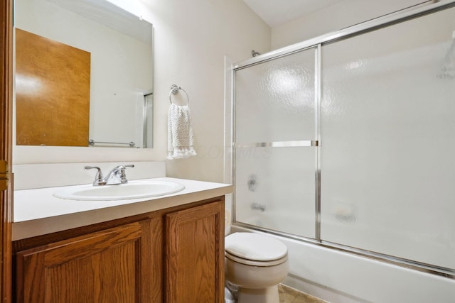 5955 Glen Village Dr, Dublin, OH 43016 - bathroom with bath / shower combo with glass door, vanity, and toilet