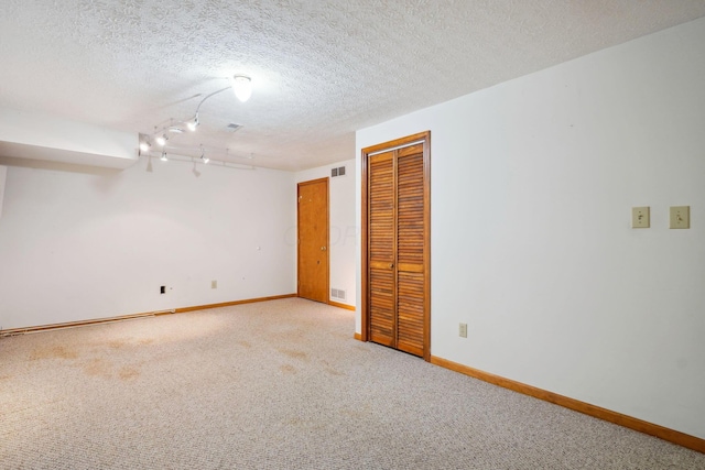 5955 Glen Village Dr, Dublin, OH 43016 - carpeted spare room with visible vents, baseboards, and a textured ceiling