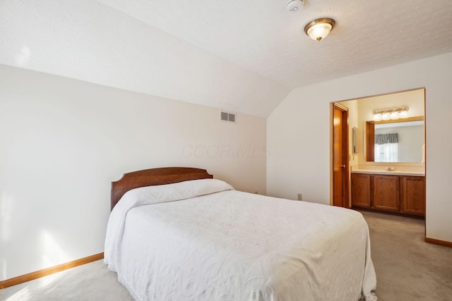 5955 Glen Village Dr, Dublin, OH 43016 - bedroom featuring baseboards, a textured ceiling, visible vents, lofted ceiling, and light colored carpet