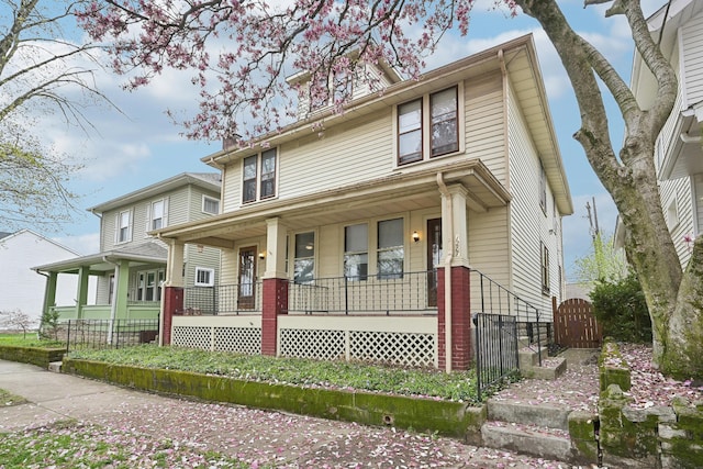 1287 City Park Ave, Columbus, OH 43206 - traditional style home with a porch, a gate, and fence