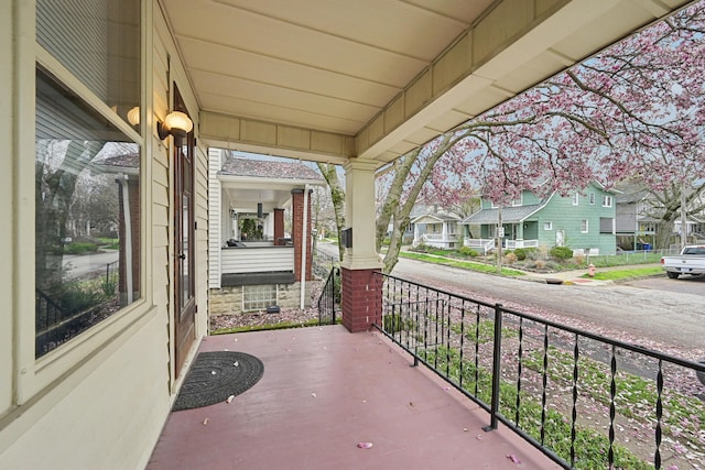 1287 City Park Ave, Columbus, OH 43206 - view of patio / terrace with covered porch and a residential view