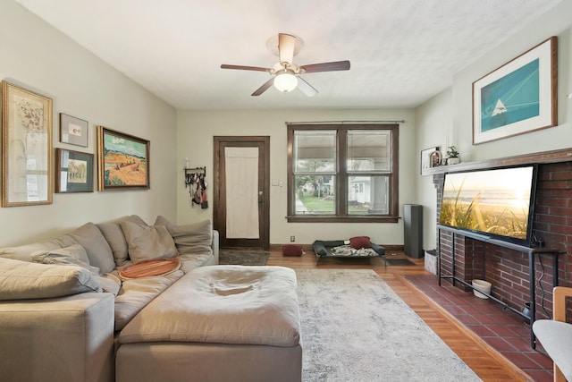 1287 City Park Ave, Columbus, OH 43206 - living area with a ceiling fan and wood finished floors