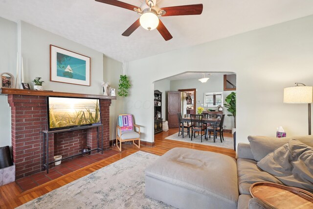 1287 City Park Ave, Columbus, OH 43206 - living room with wood finished floors, a ceiling fan, and baseboards