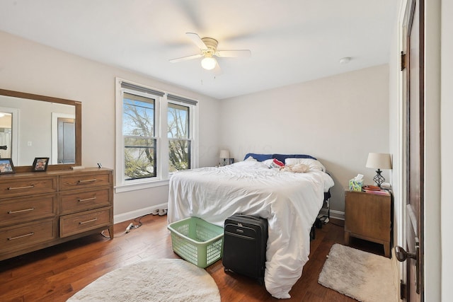 1287 City Park Ave, Columbus, OH 43206 - bedroom with baseboards, dark wood-type flooring, and ceiling fan