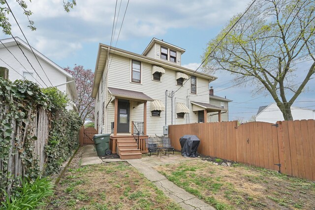 1287 City Park Ave, Columbus, OH 43206 - back of property with a gate and a fenced backyard