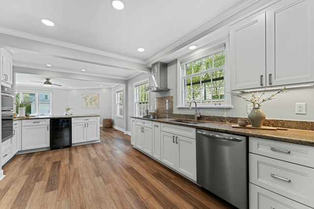 kitchen featuring wall chimney exhaust hood, stainless steel dishwasher, a sink, dark wood-style flooring, and beverage cooler