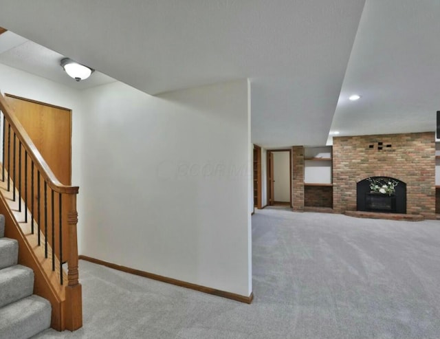 4070 Tradersville Brighton Rd, London, OH 43140 - living area featuring stairway, a fireplace, and carpet flooring