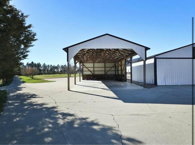 4070 Tradersville Brighton Rd, London, OH 43140 - exterior space featuring a detached carport and driveway