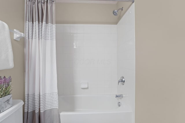 full bath with shower / bath combo and toilet