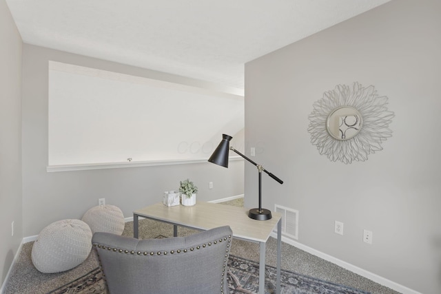 living area with carpet flooring, visible vents, and baseboards